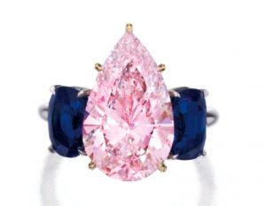 Lot 362 - A Magnificent Platinum, 18K-Gold, Fancy Purplish-Pink Diamond And Sapphire Ring