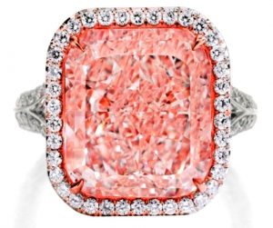 Lot 121 - An Important Platinum, 18K Rose-Gold, Fancy Light PInk Diamond And Diamond Ring