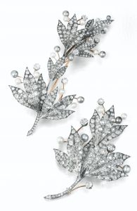 Lot 361 - Natural Pearl and Diamond Devant-de-Corsage Brooches