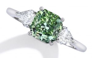 Lot 101 - Rare Platinum, Fancy Vivid Green Diamond and Diamond Ring