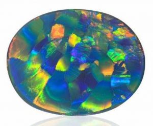 PHENOMENAL 1ST PLACE - JOEL PRICE 100.66 CT. HARLEQUIN PATTERN BLACK OPAL