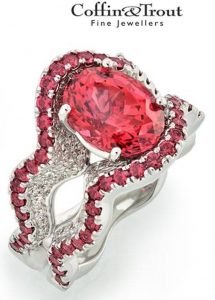 BRIDAL WEAR MANUFACTURING HONORS - RANDY COFFIN, PLATINUM RING WITH 4.42-CARAT OVAL RED SPINEL ACCENTED WITH ROUND RED SPINELS AND DIAMONDS