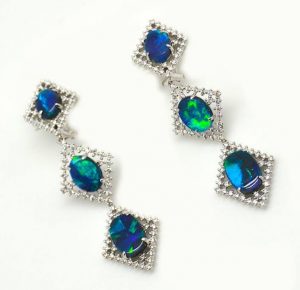 EVENING WEAR PLATINUM HONORS, JOHN FORD, PLATINUM EARRINGS WITH OVAL BLACK OPALS ACCENTED WITH DIAMONDS