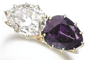 LOT 289 – ALEXANDRITE AND DIAMOND RING UNDER INCANDESCENT LIGHT