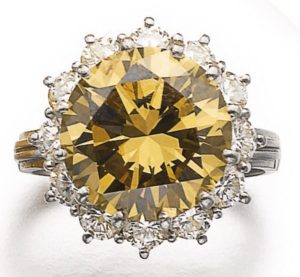 LOT 566 - FANCY YELLOW-BROWN DIAMOND RING