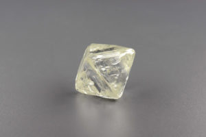 85.62-CARAT, ISOMETRIC OCTAHEDRAL, YELLOWISH HUE, ROUGH DIAMOND